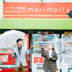 Groom wears a checkered blazer