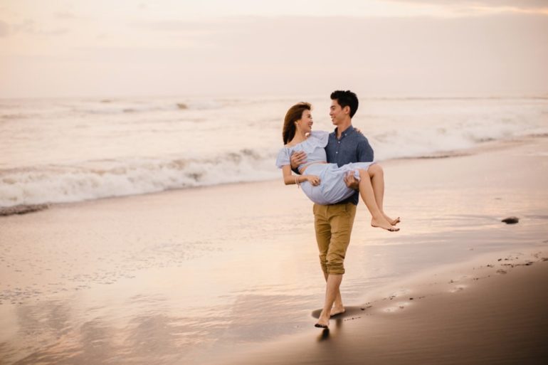 Couples Beach Portraits, a Boyfriend and Girlfriend in love with the most  amazing sunset EVER! Engagement photos on the beach – Savoring the Sweet  Life Blog