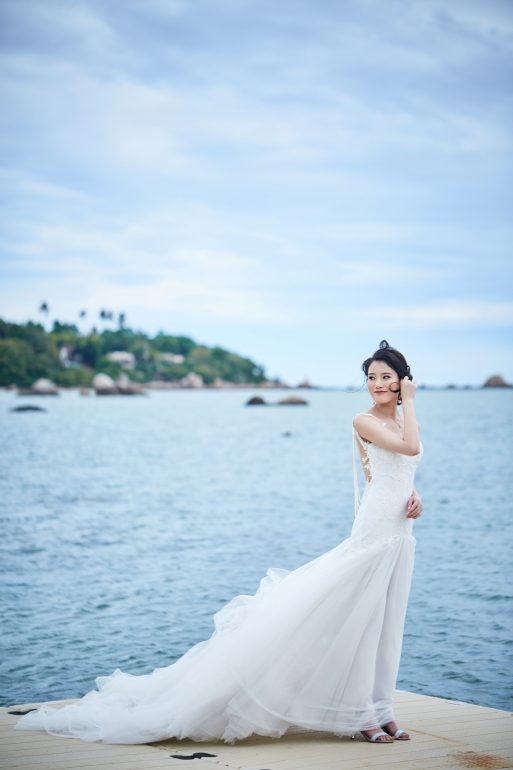 bride pushes back her hair