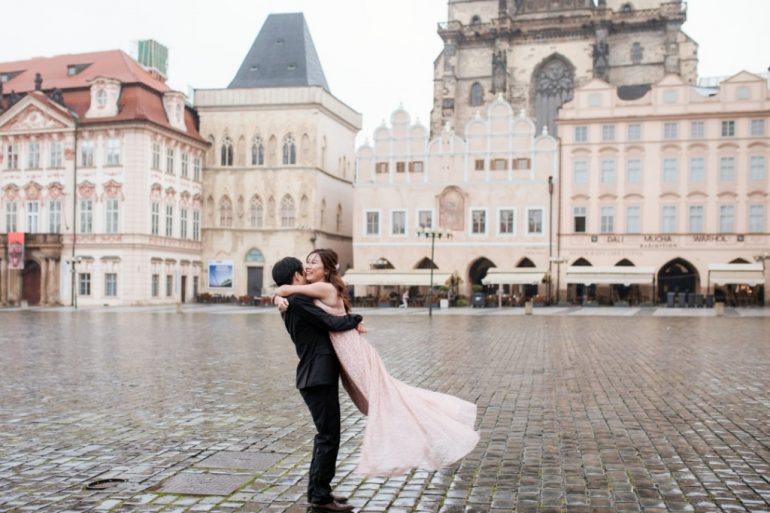wedding photography poses groom lifts bride and spins her around