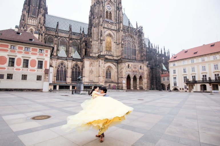 wedding photography poses groom lifts bride and spins her around