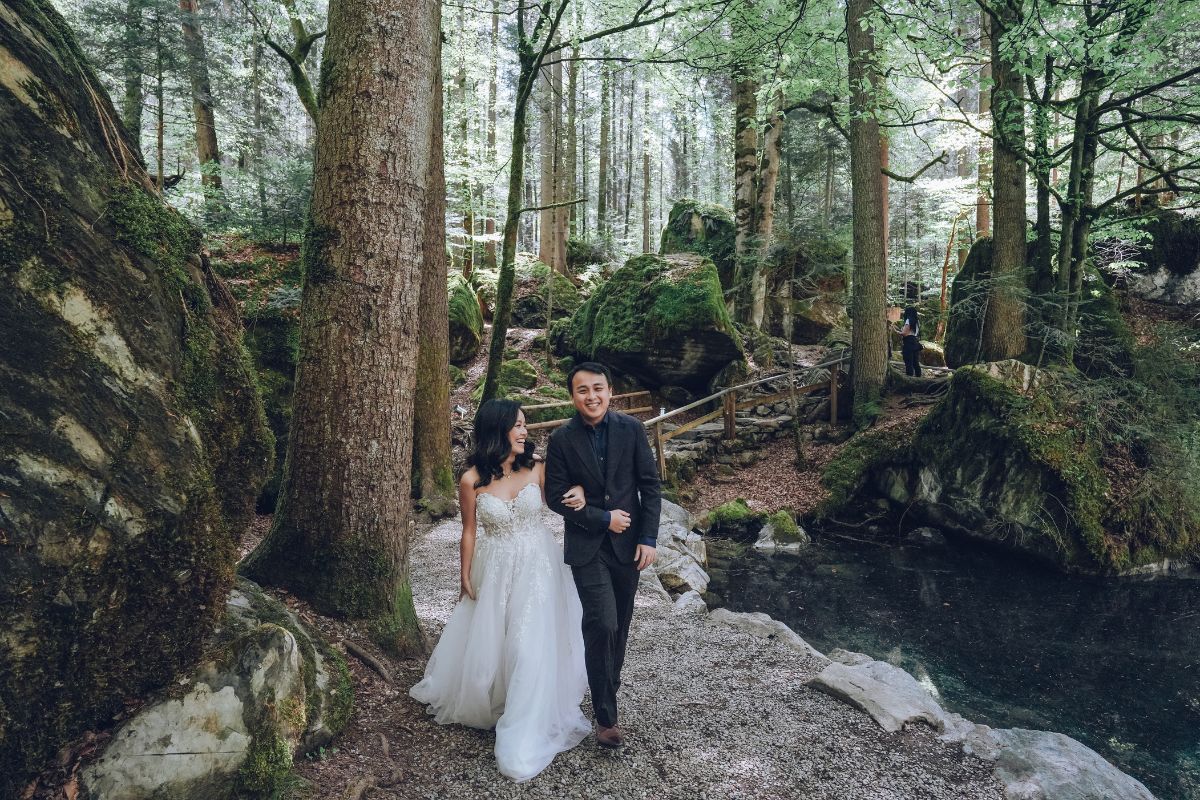 Couple having a pre-wedding photoshoot at Lake Blausee, Switzerland